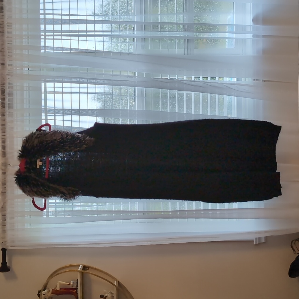 Black Sleeveless Sweater Dress with Faux Fur Collar.
